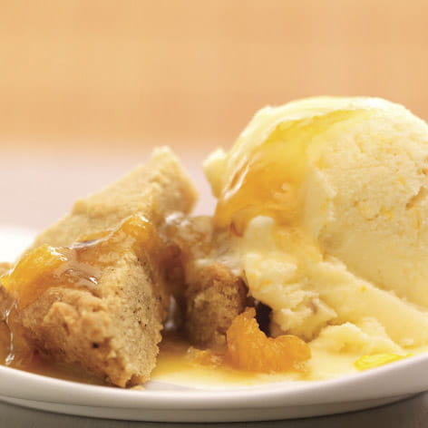 Saffron apricot sorbet and hazelnut crumble on a bed of apricots with saffron dressing